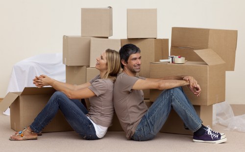 Professional removals team packing household belongings for a Northwood move
