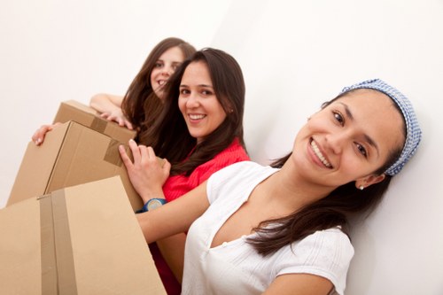 Same day house removals team loading boxes quickly and safely