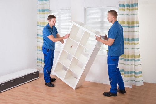 Boxes, sofa and household items prepared for flat relocation